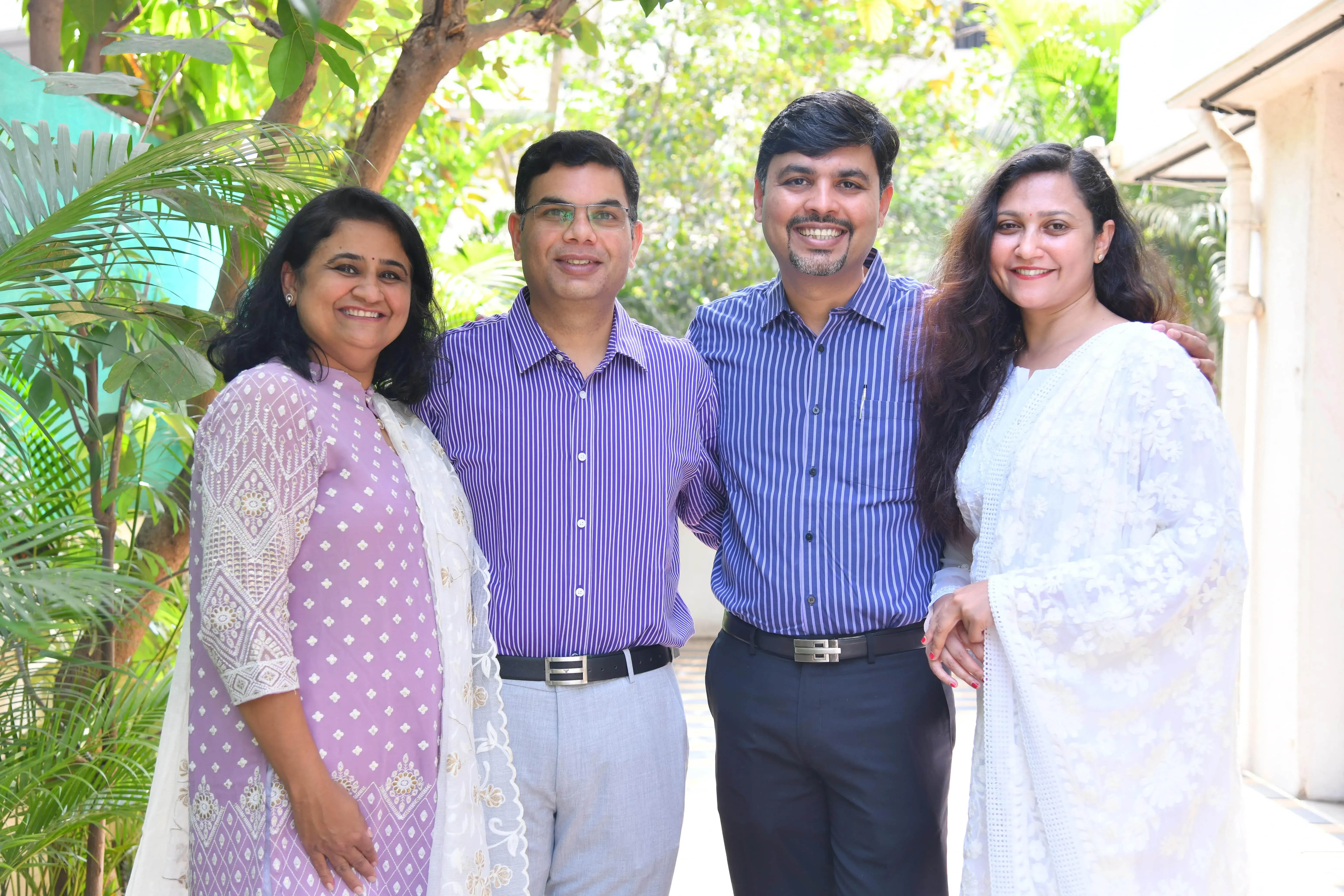 Satyak's four founding doctors standing together in the garden